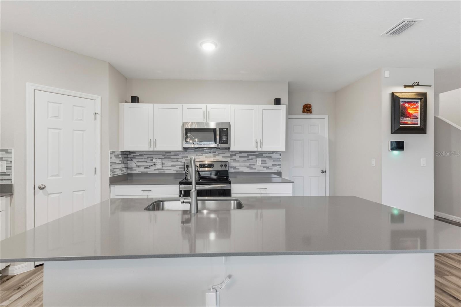 Shaker cabinets and backsplash