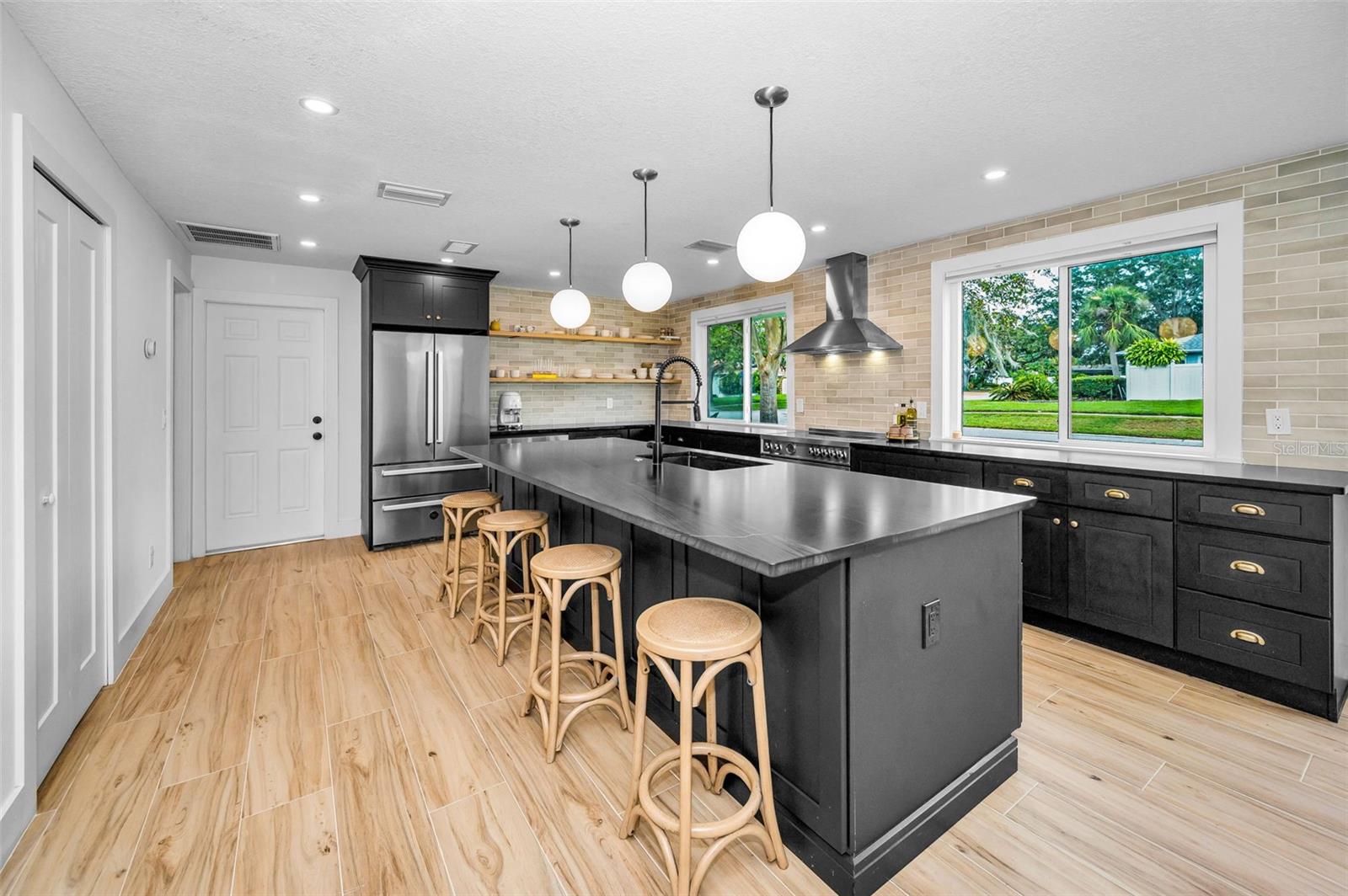 Kitchen with Quartzite Counters and real Brass Hardware