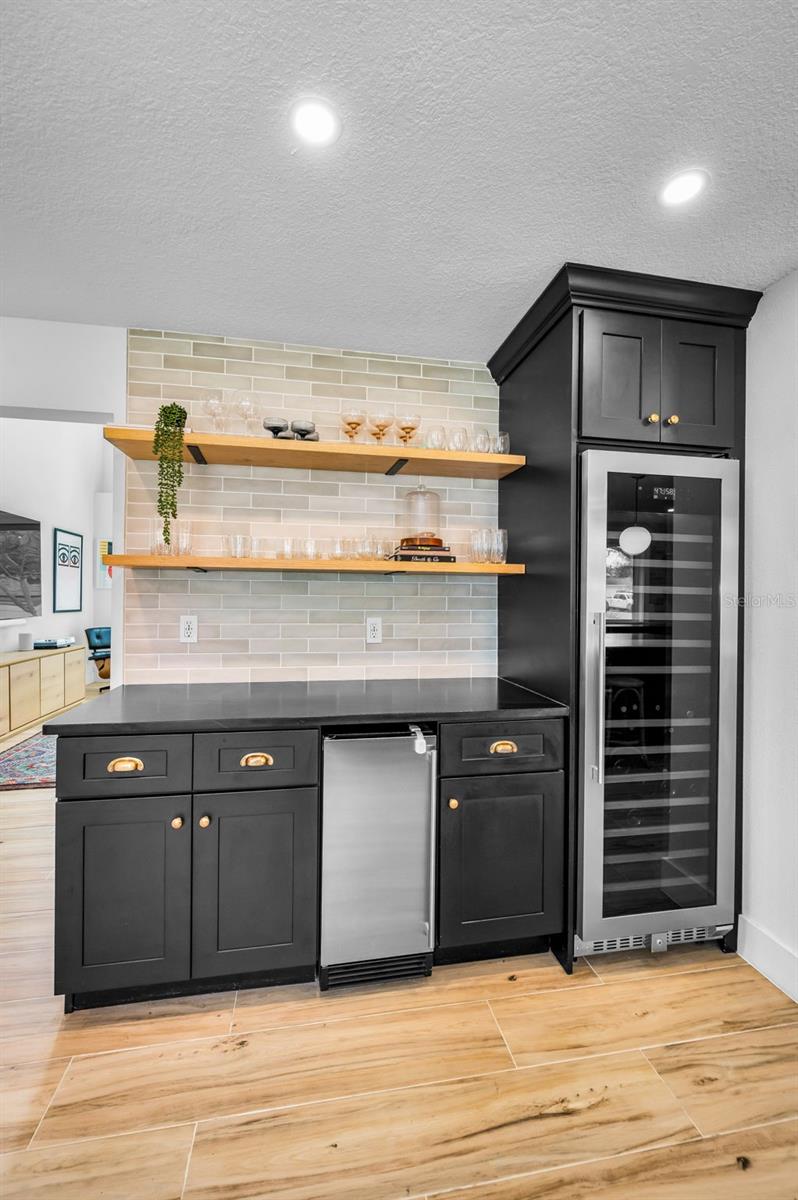Bar with 72" Wine Fridge and Ice Maker