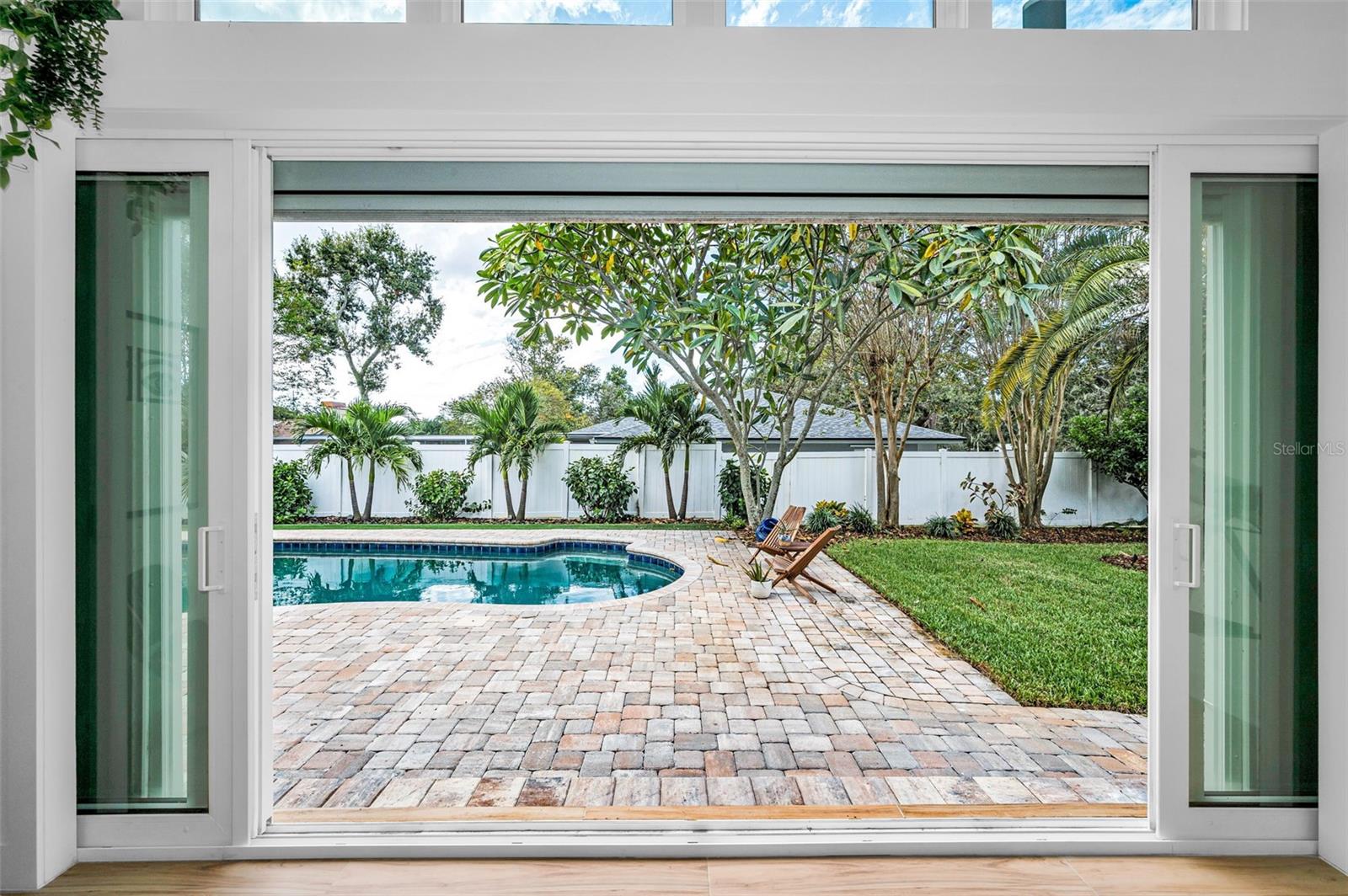 Multi Slide Door Opens to the Pool Deck