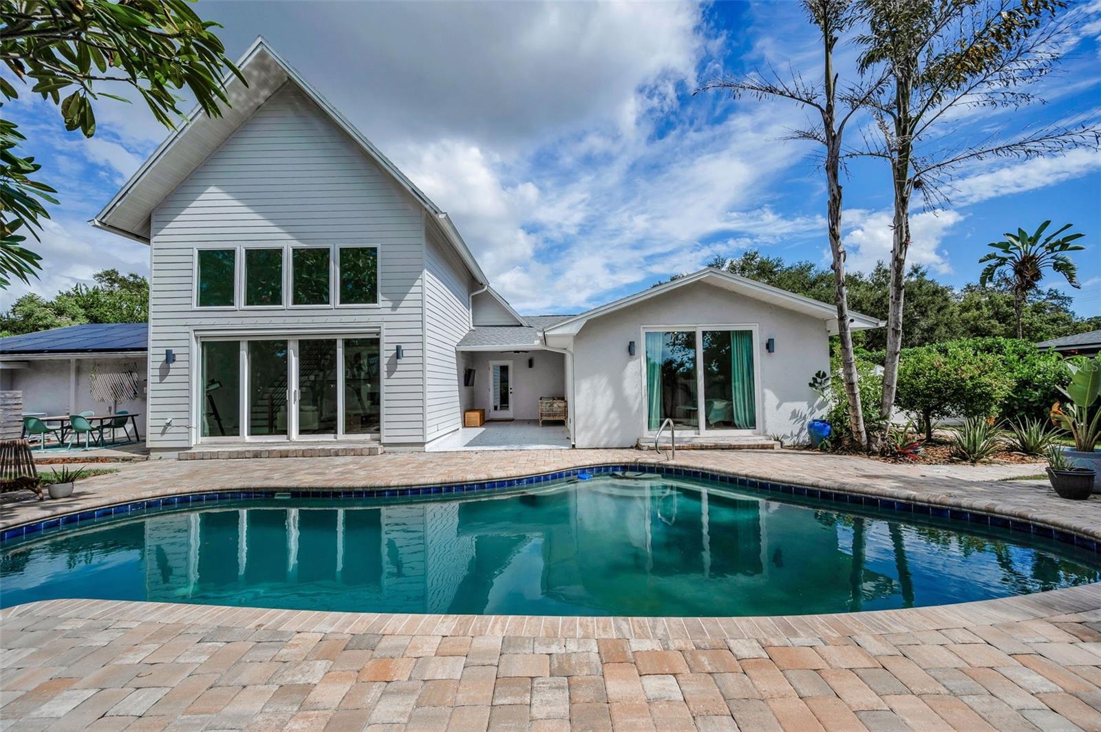Backyard Oasis with Multiple Entertaining Areas