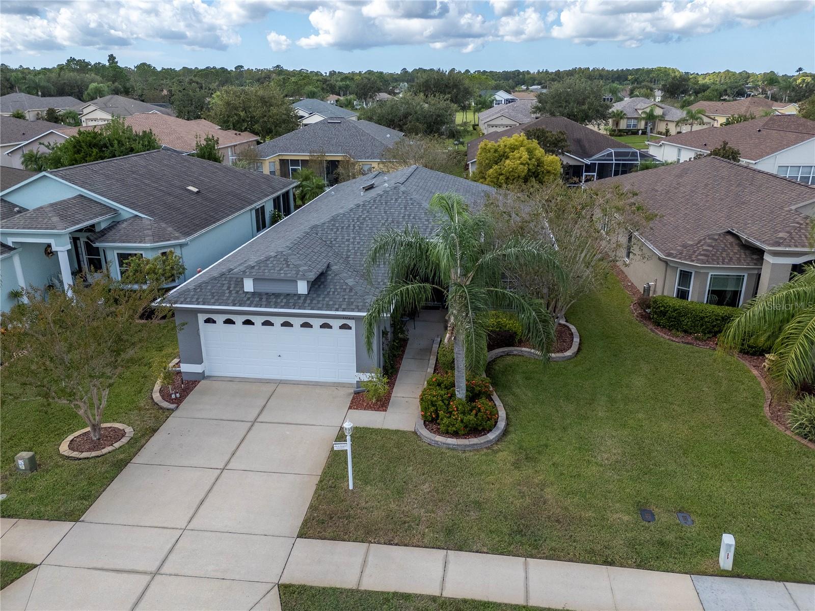 Two-car garage. Golf cart comes with home.