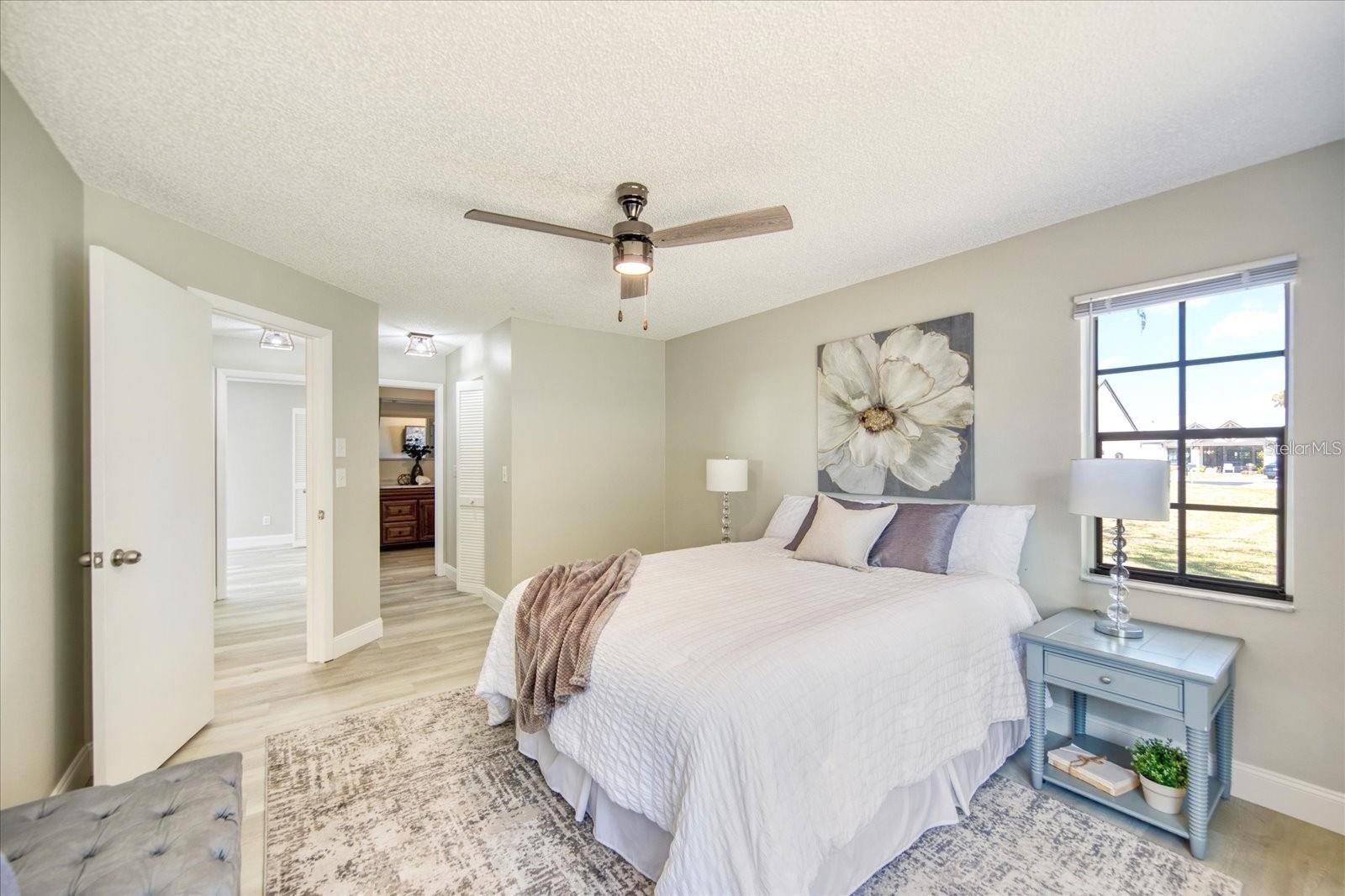 New ceiling fan here too. Note coordinating flooring and paint color throughout~