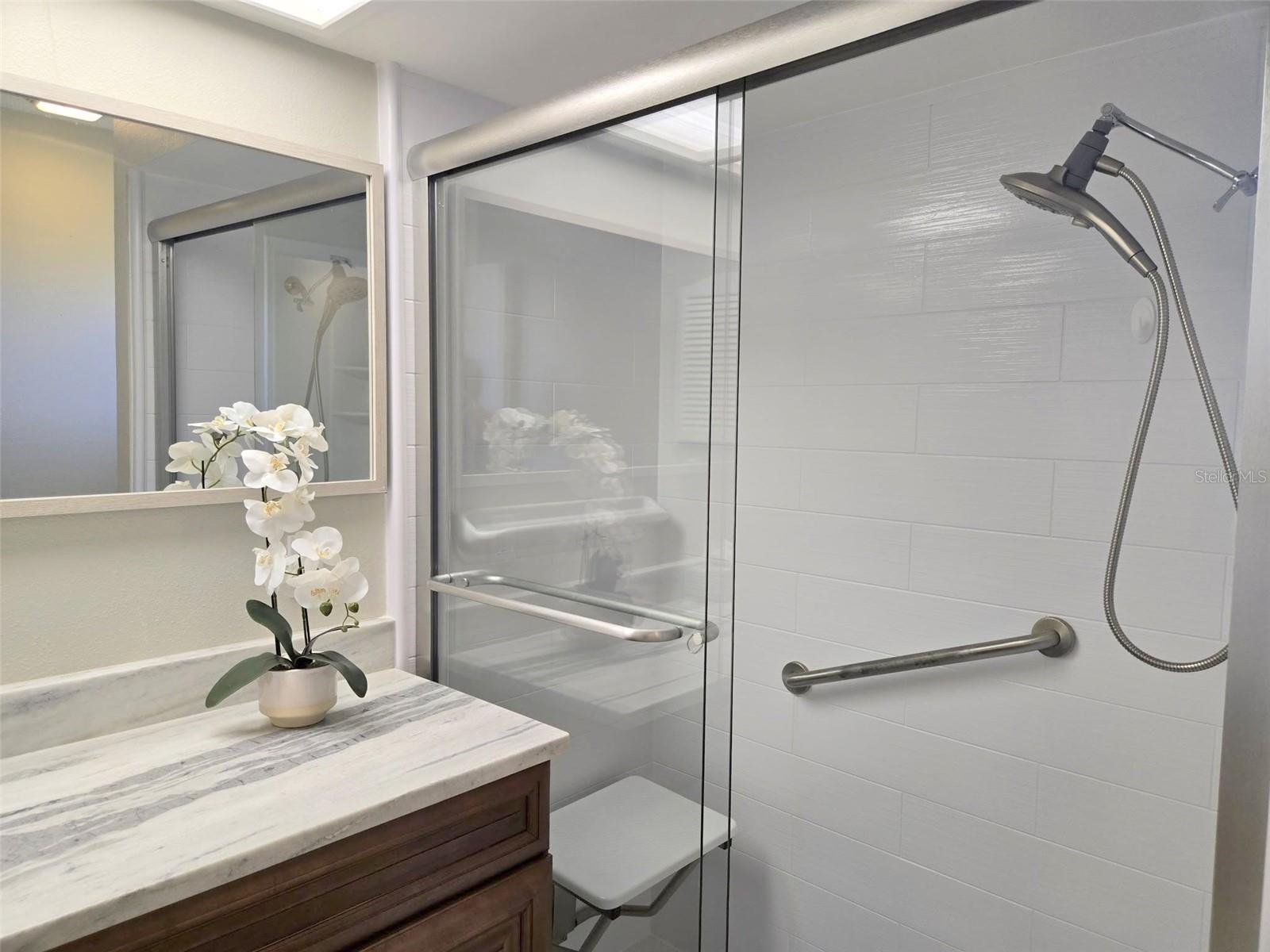 New Bath Fitter shower with bench seat, support bar, & sturdy glass doors~