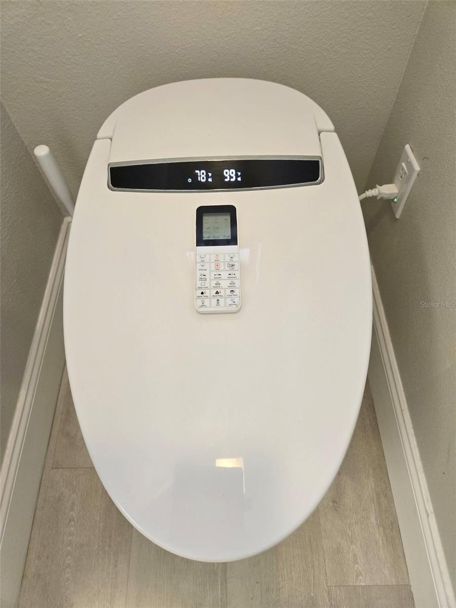 New commode/bidet has all the bells & whistles - you'll like it!