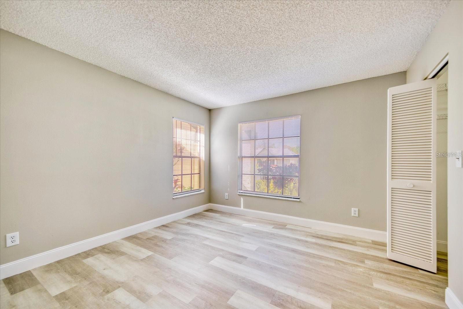 Second bedroom with another big walk-in closet is on the front of the house~