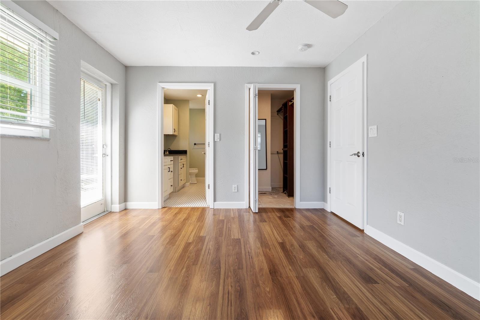 Primary Bedroom with en suite bathroom and walk in closet