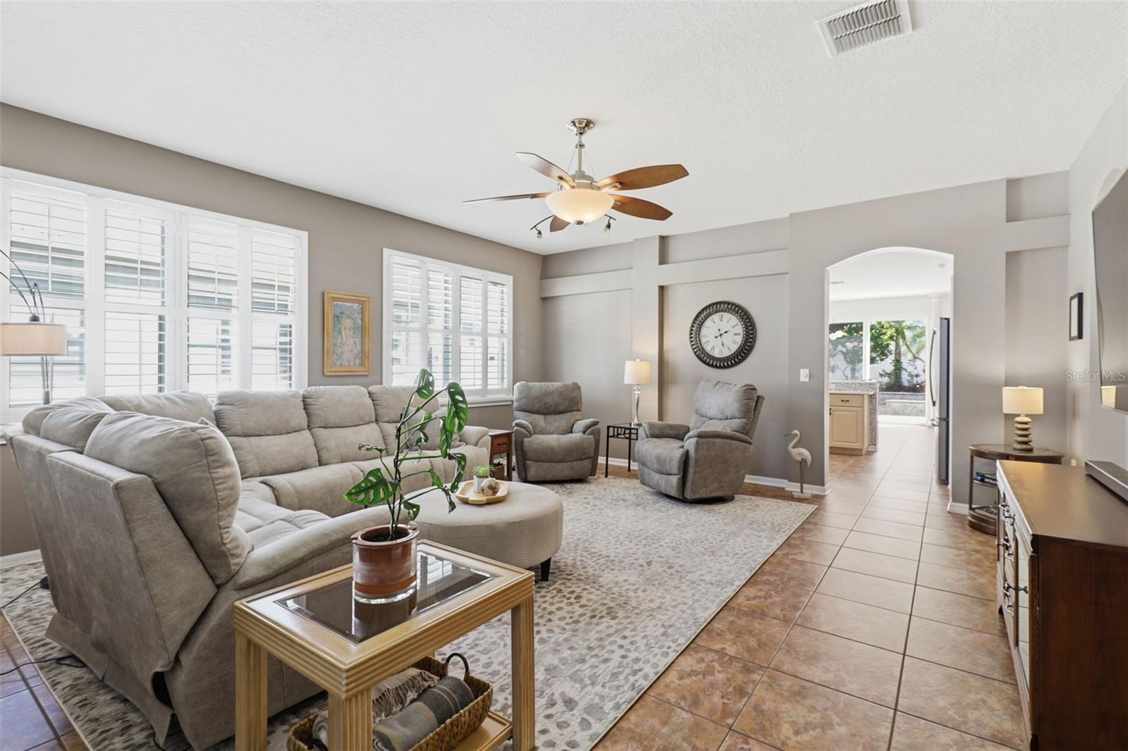Bright, spacious living area with beautiful oak hardwood floors—perfect for movie nights, game days, or just kicking back and relaxing.
