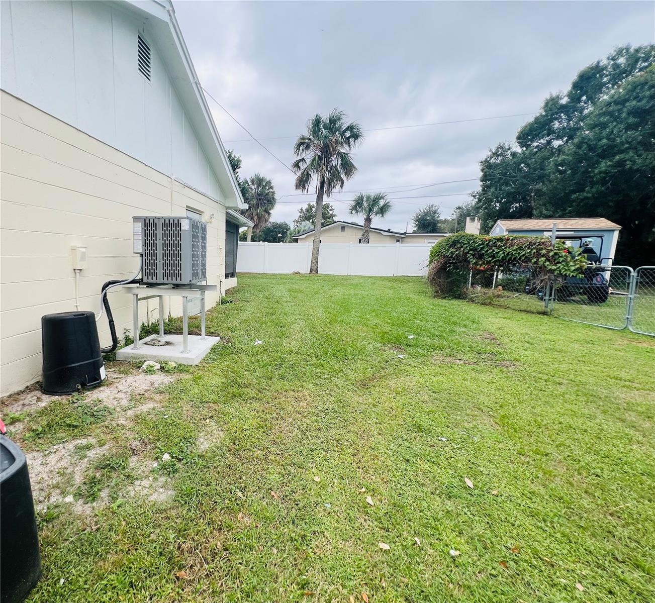 SIDE VIEW OF YARD AND HOUSE