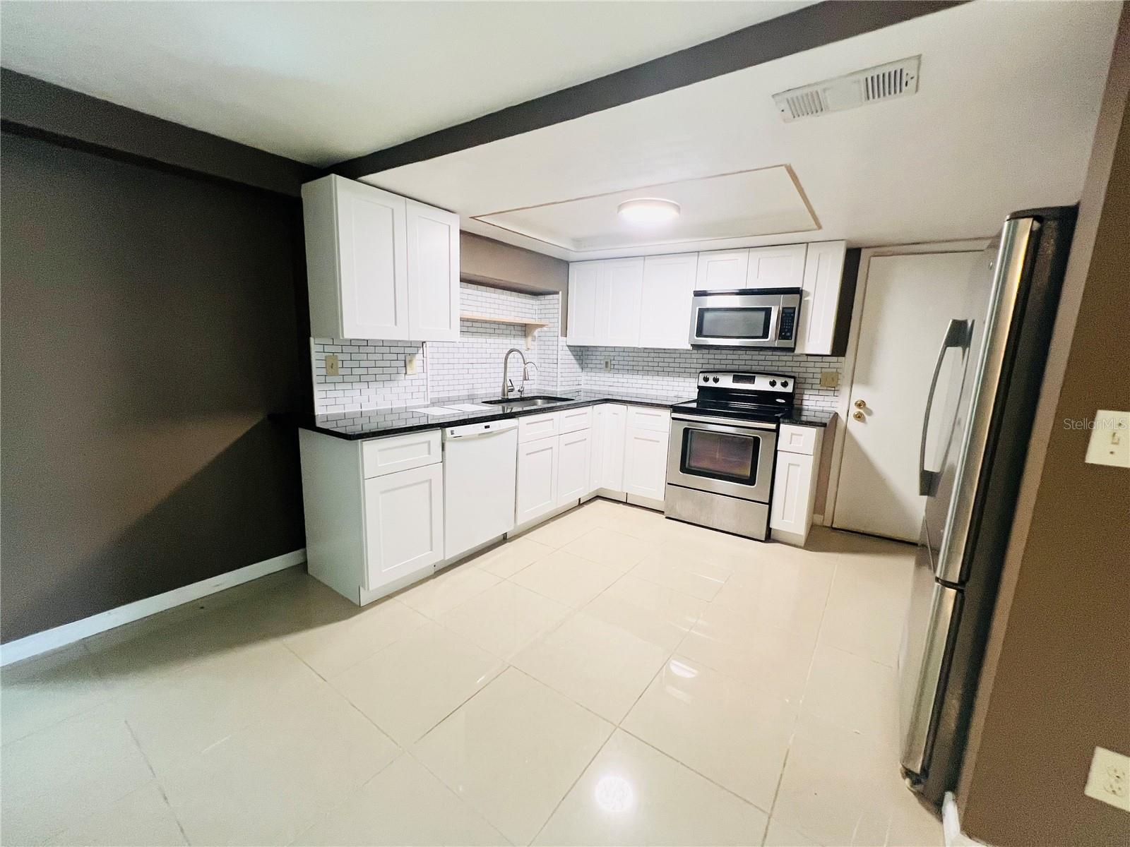 KITCHEN VIEW FROM DINING AREA