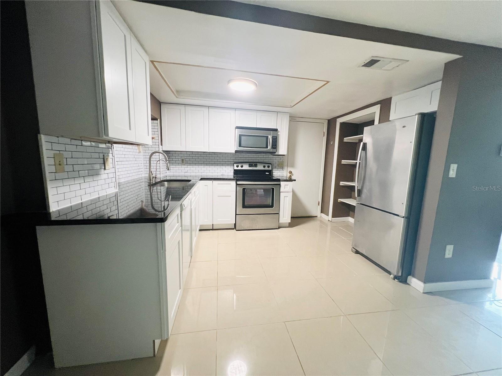 KITCHEN VIEW FROM DINING AREA