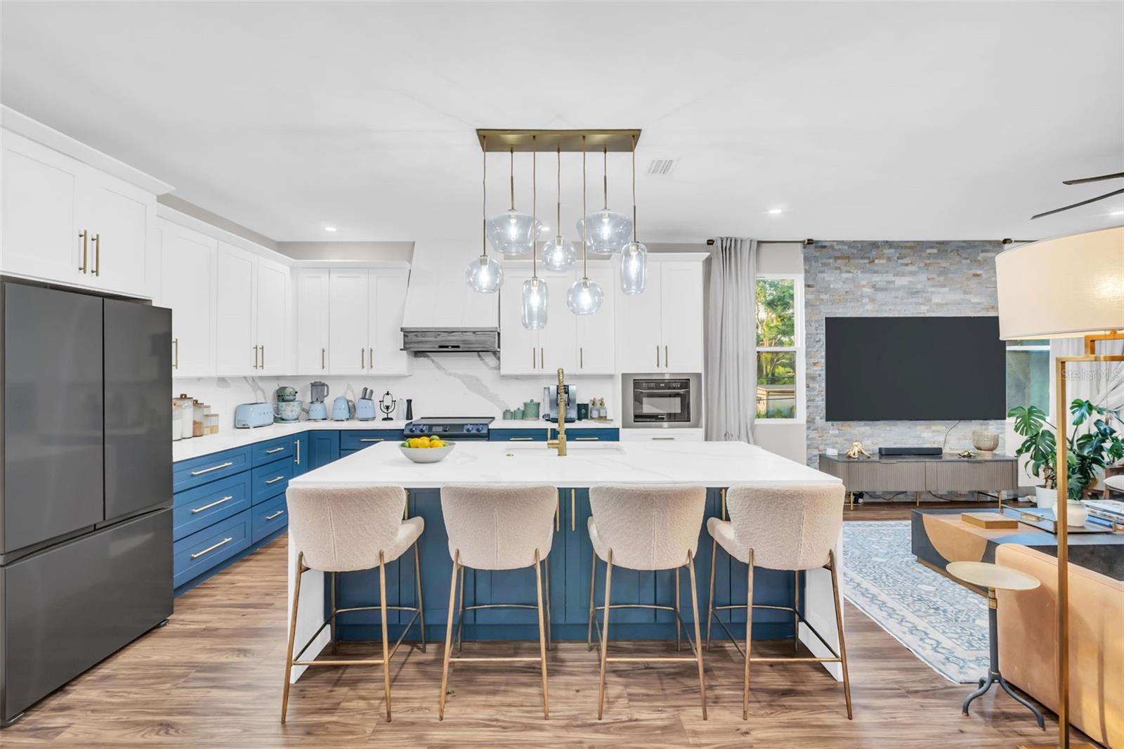 Designer lighting fixtures throughout.