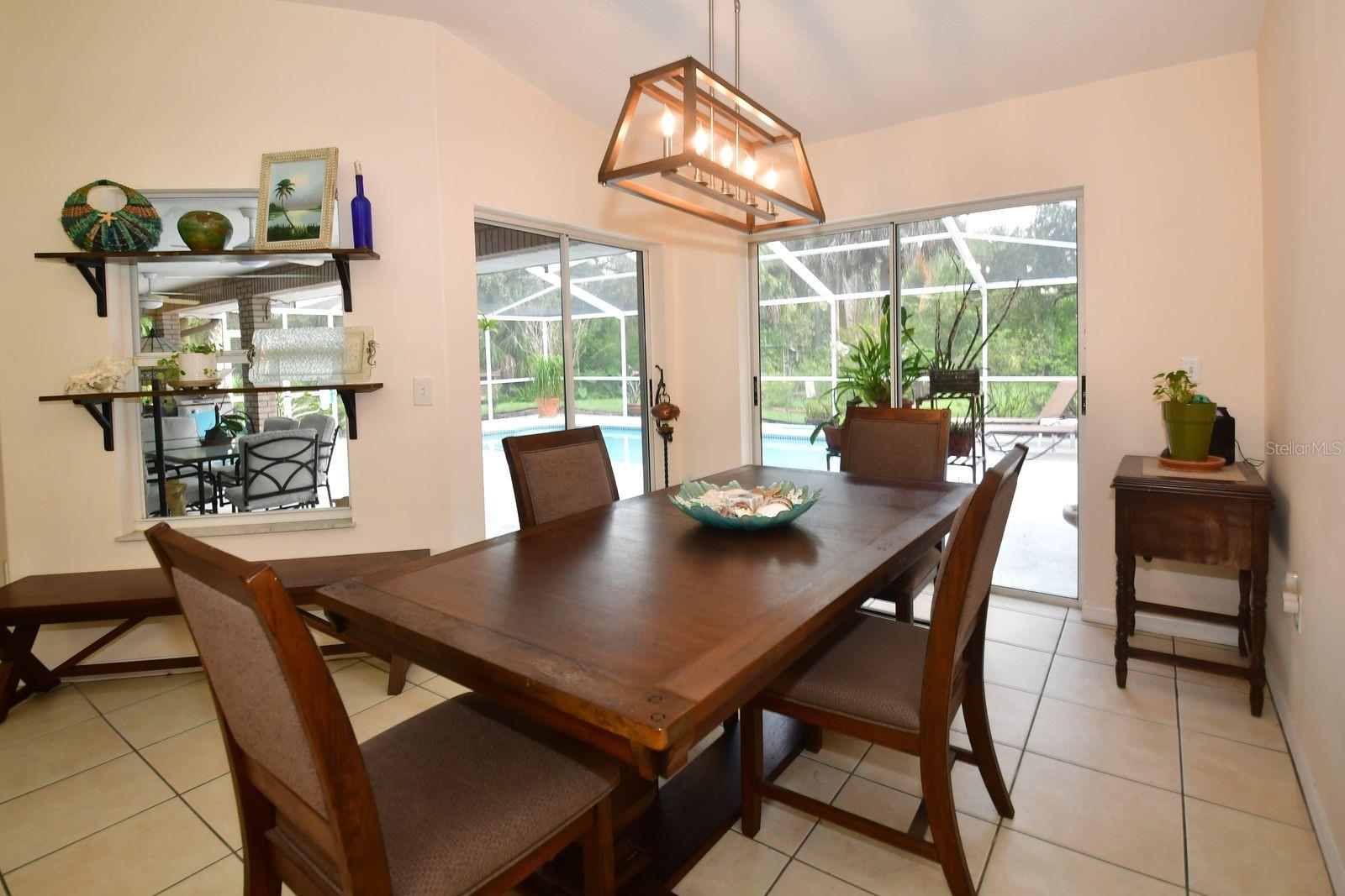 Dining Room opens to the Pool and Lanai