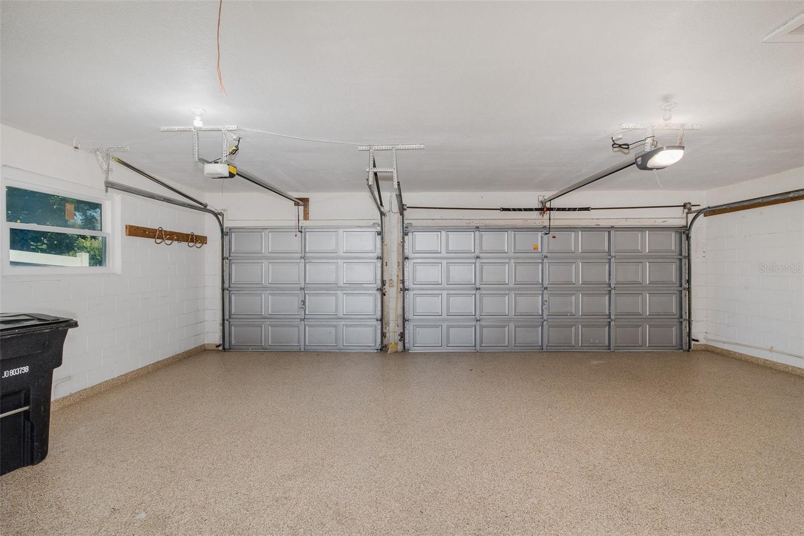 Oversized 3 car Garage with Acrylic Flooring