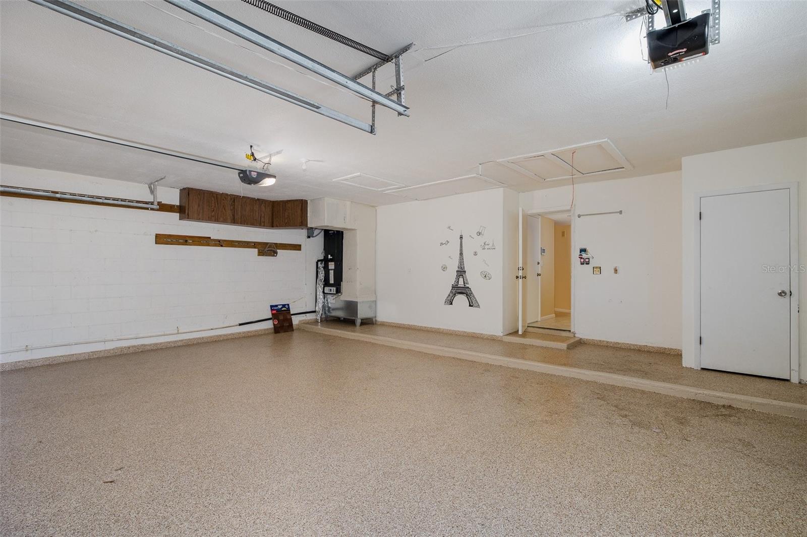 Oversized 3 car Garage with Acrylic Flooring