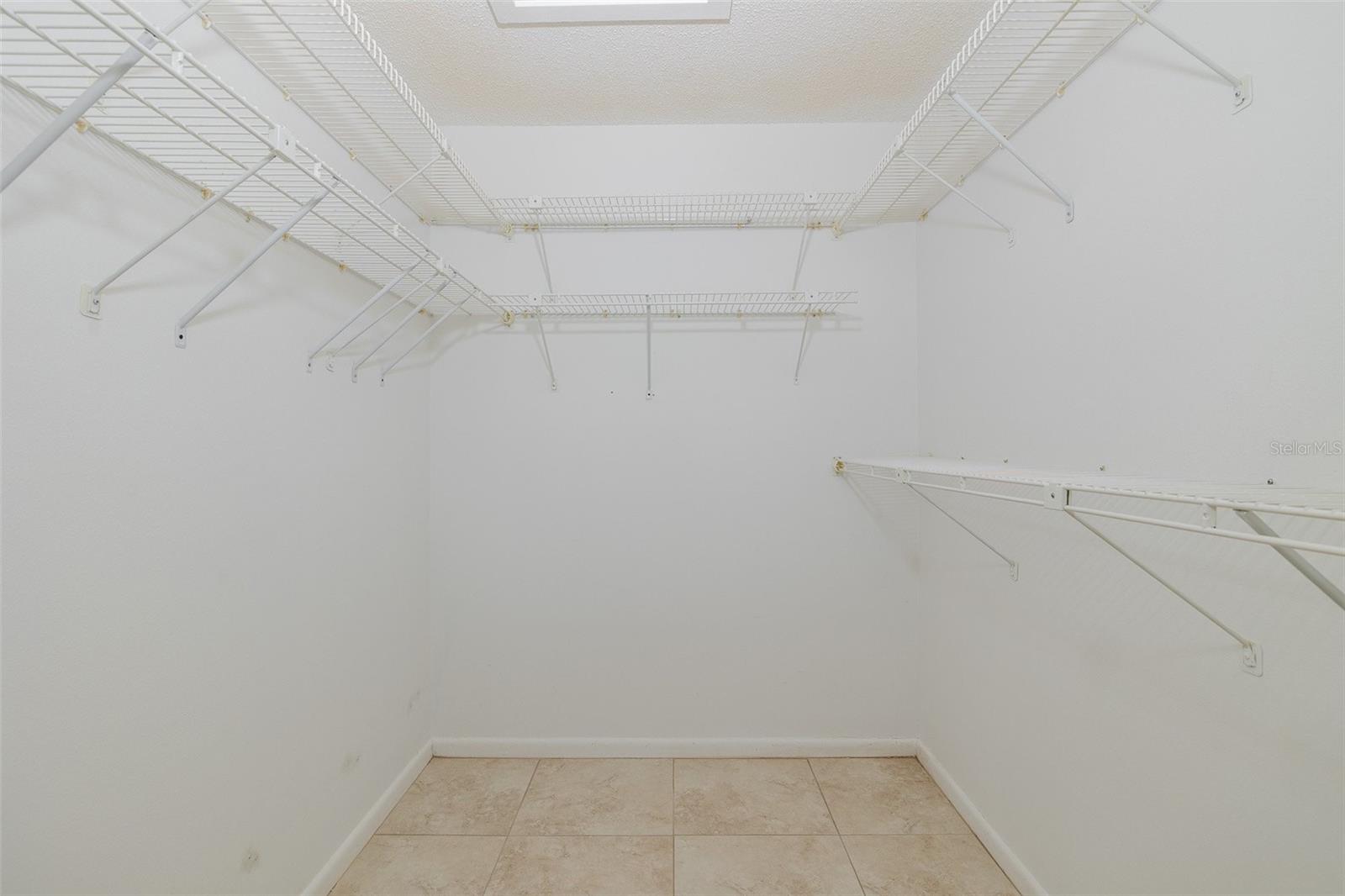 2 Primary Bedroom WalkIn Closets