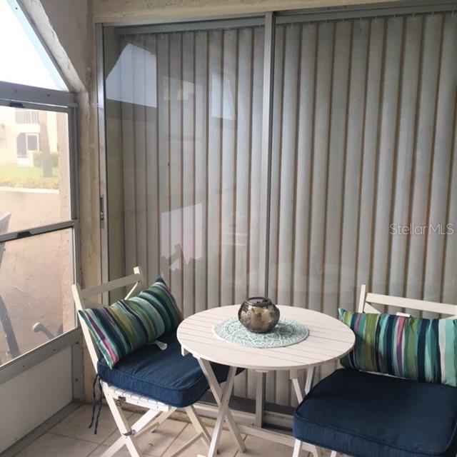 Sun room enclosed with laundry closet