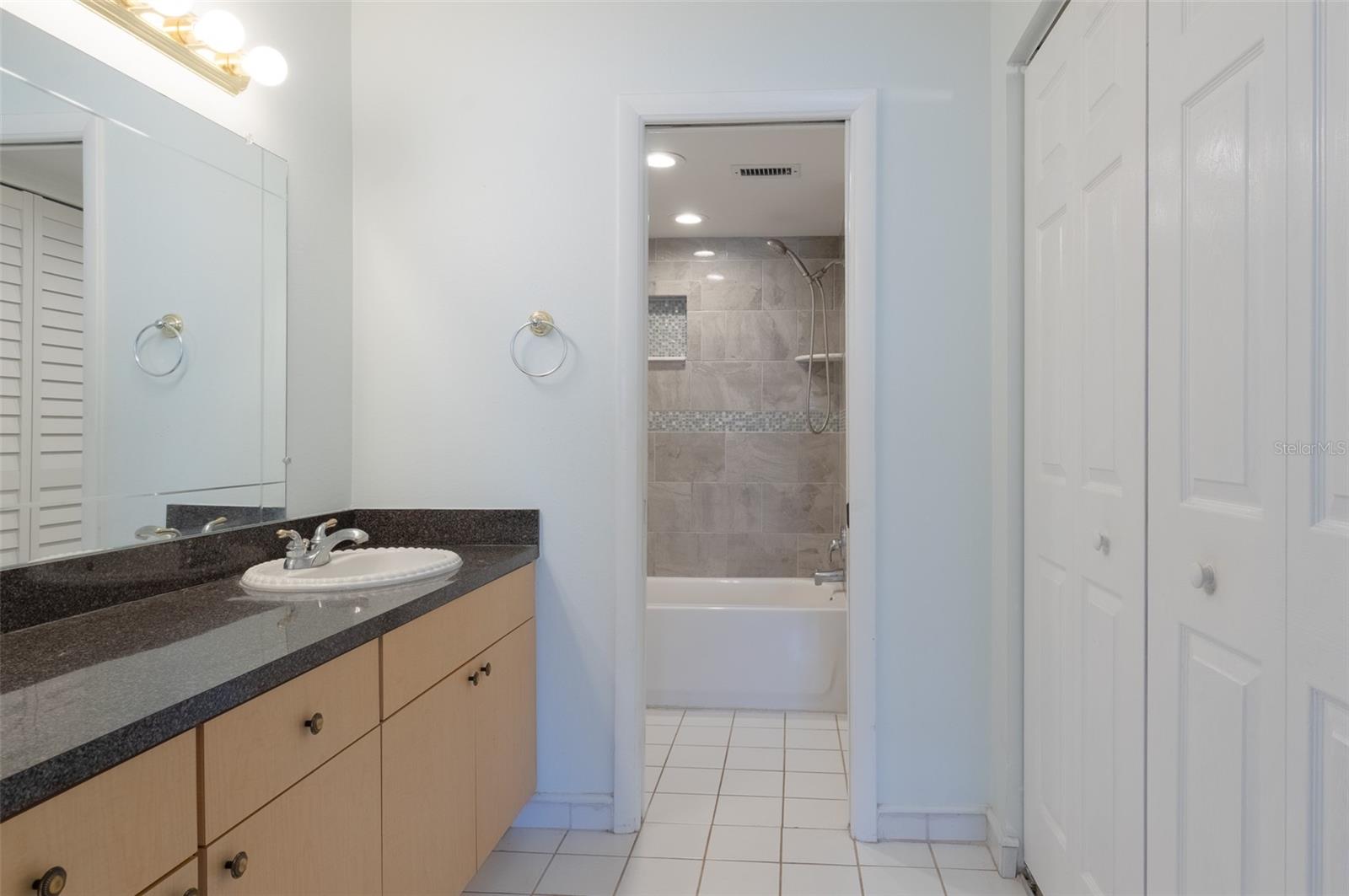 Primary bathroom with tub shower