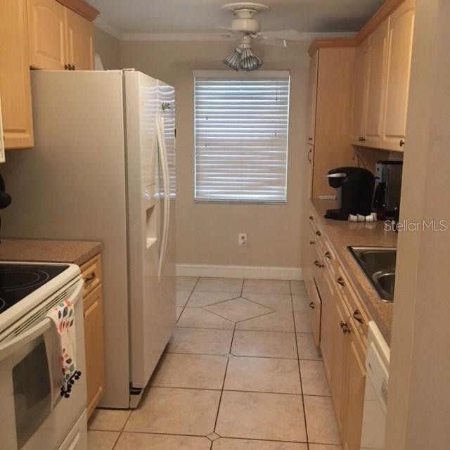 Kitchen has front facing window