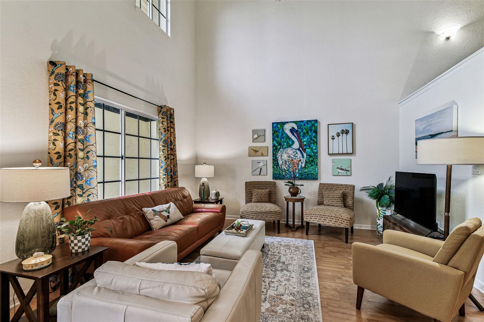 Spacious Living Area on 2nd Floor and Opens to Kitchen and Dining Areas