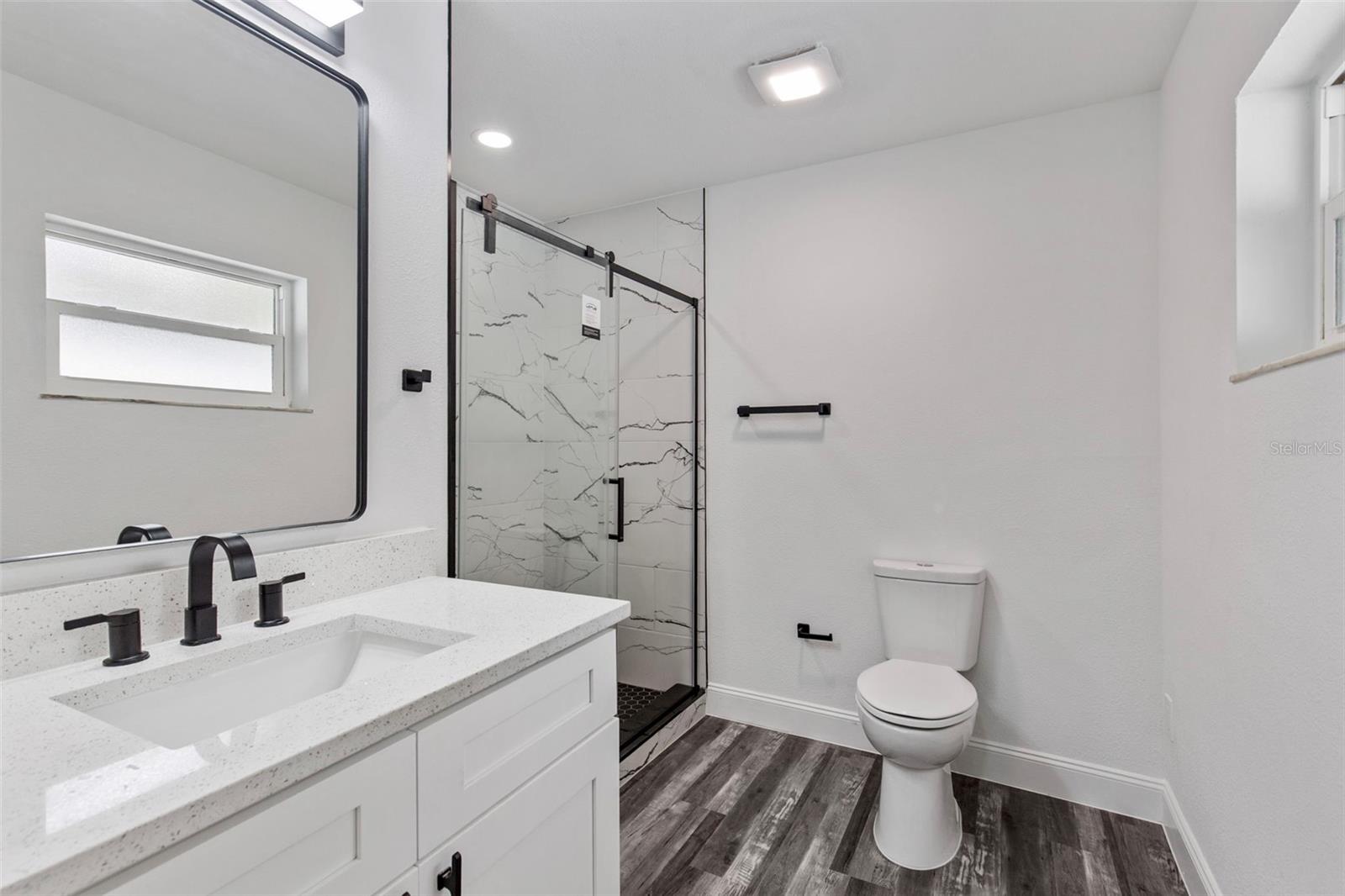 2d master bath with glass enclosure