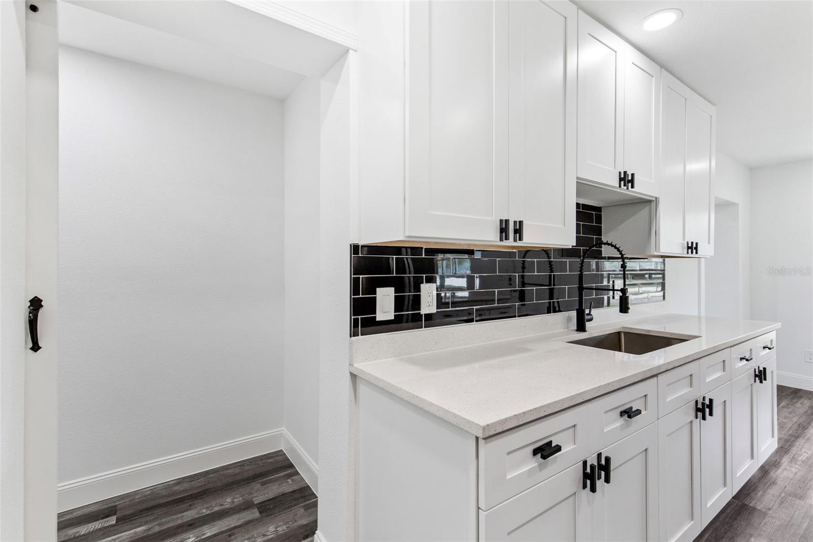 kitchen is the center of the home with tall cabinets