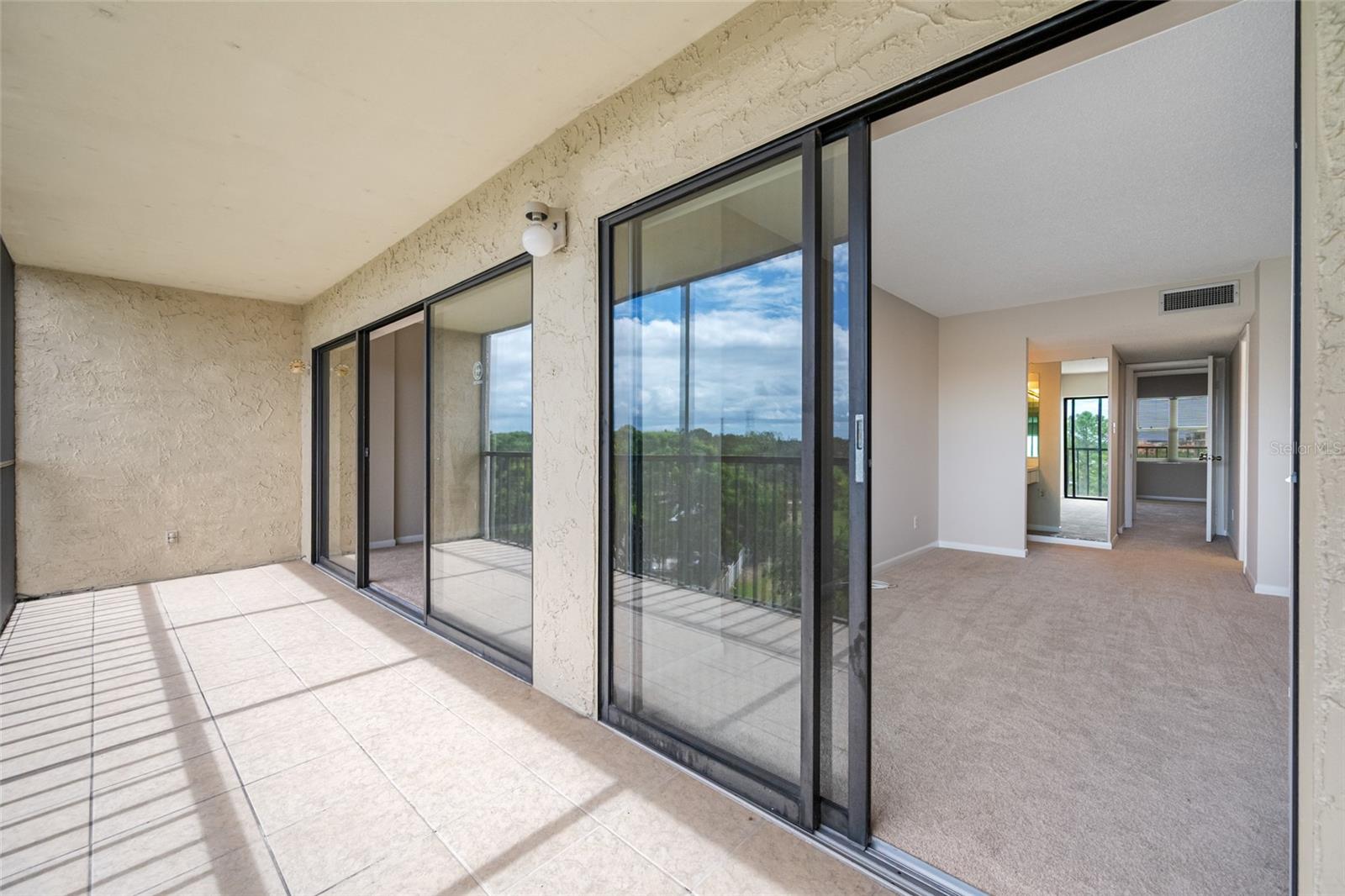 Sliding door allows access direct from primary bedroom