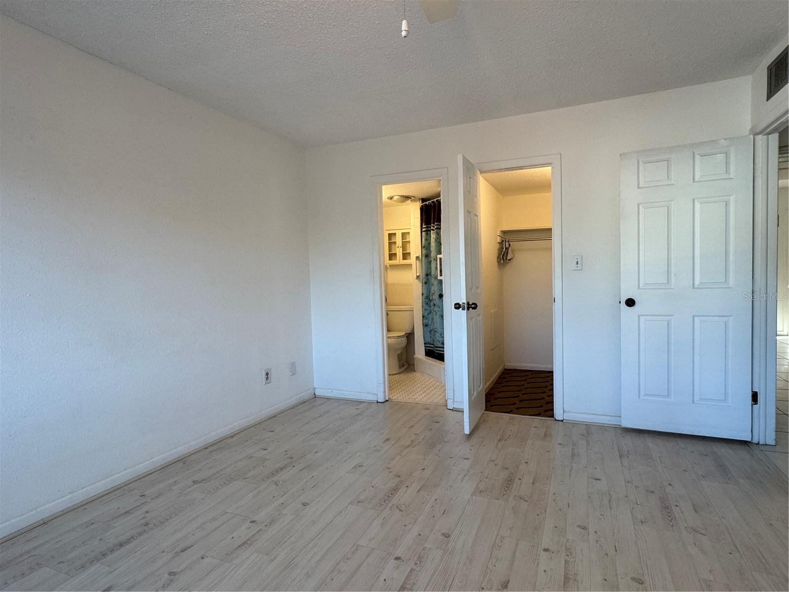 Primary Bedroom Full Bath & Walk-In Closet