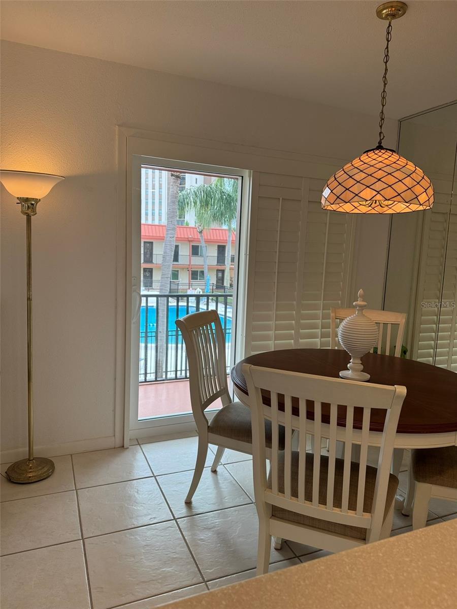 View from Kitchen To Pool through Hurricane Rated Sliding Glass Doors