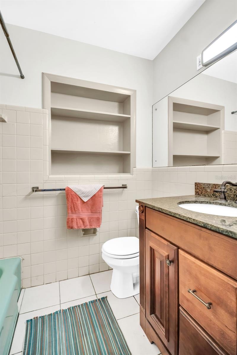 Bath 3 with built ins and tub/shower combo