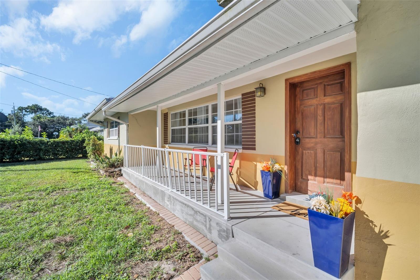 Front with long porch!