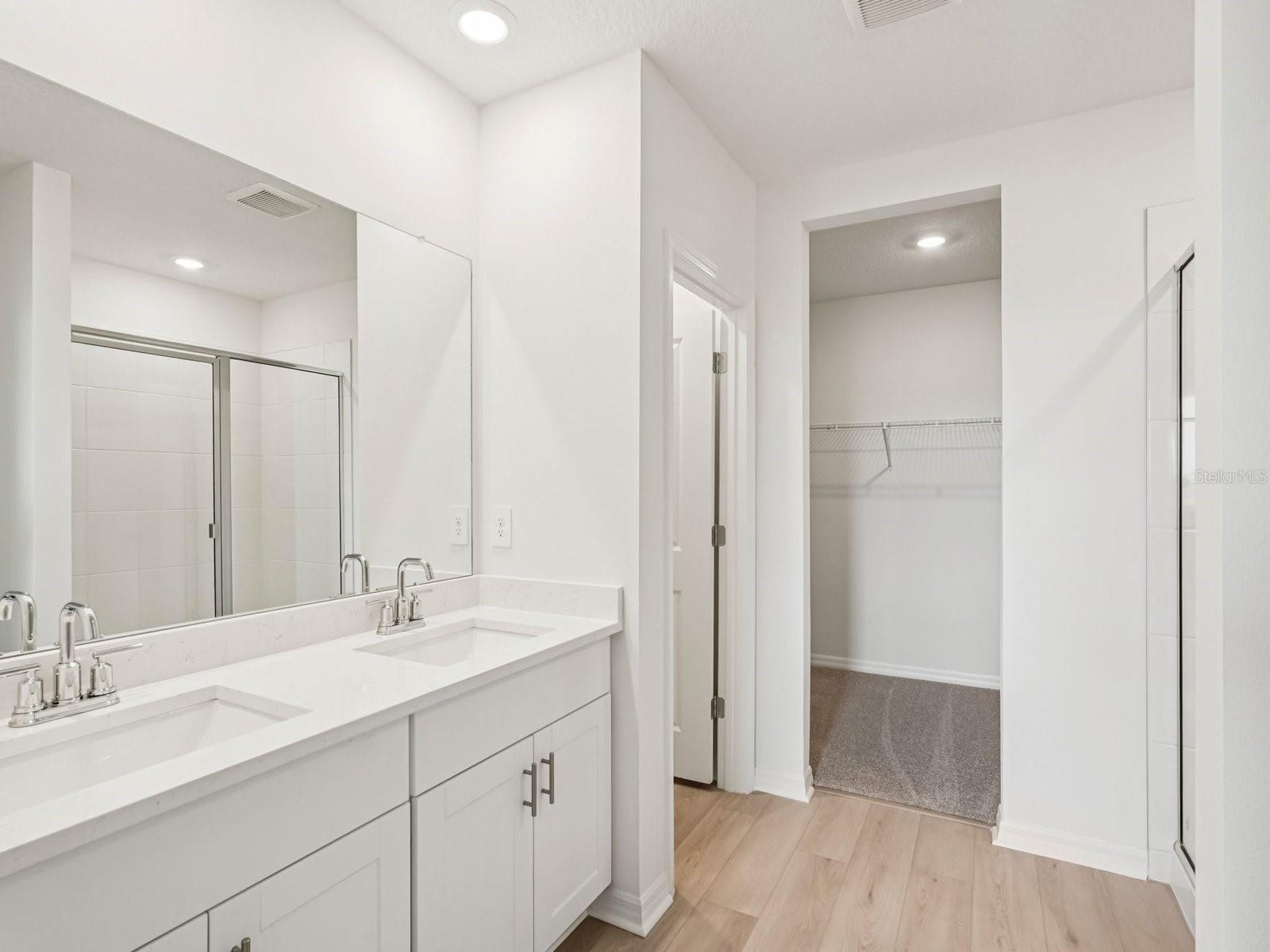 Interior photos are not of the actual home but are photos of the builder home with same floorplan with similar interior finishes and features.