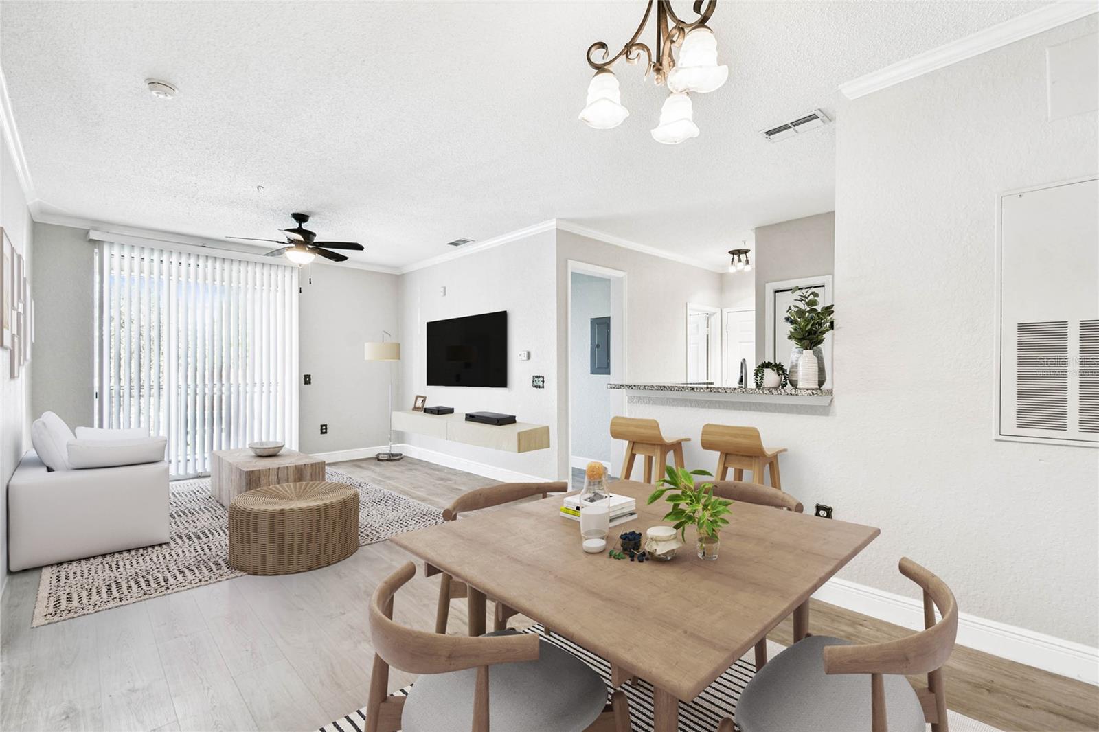 Virtually staged - dining room open to living room