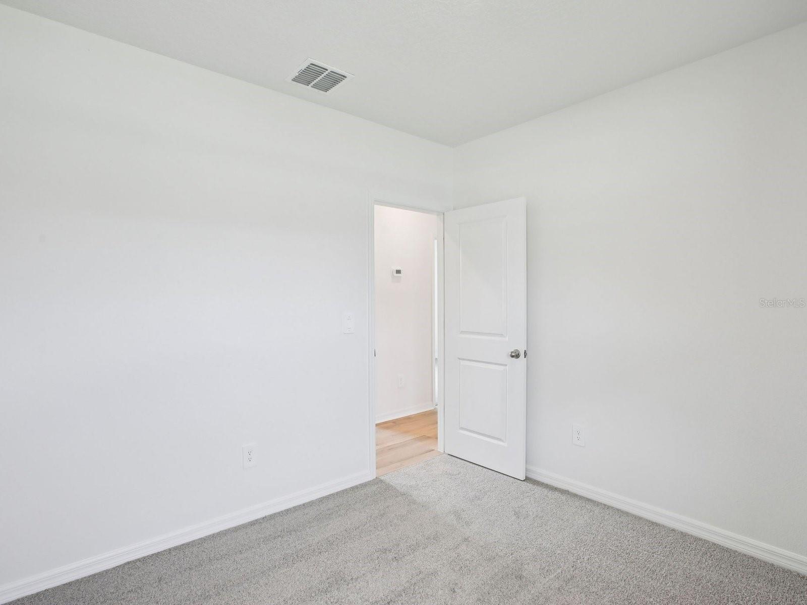 Photo is not of the actual home but of a builder home with same floorplan with similar interior finishes.