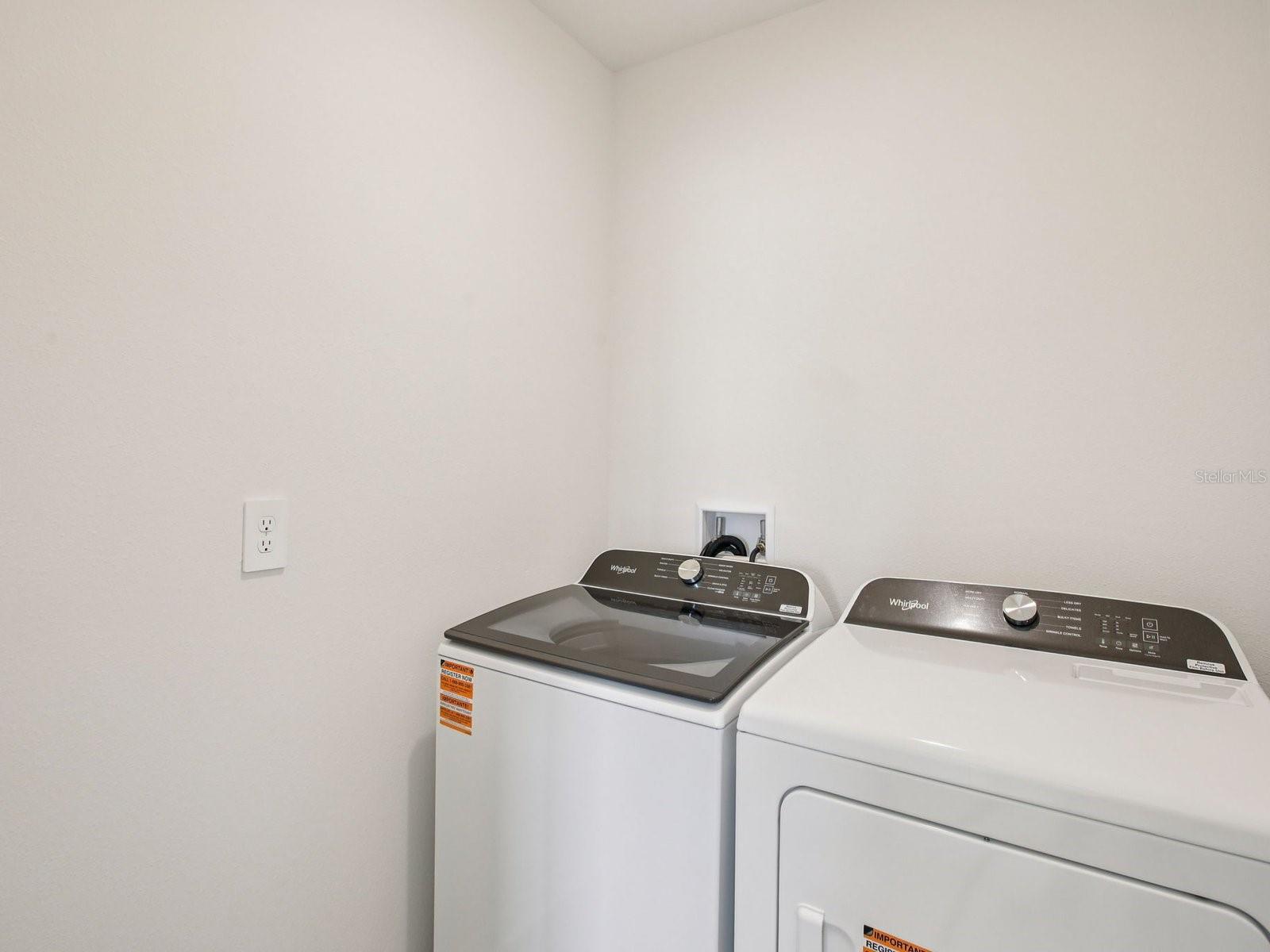 Photo is not of the actual home but of a builder home with same floorplan with similar interior finishes.