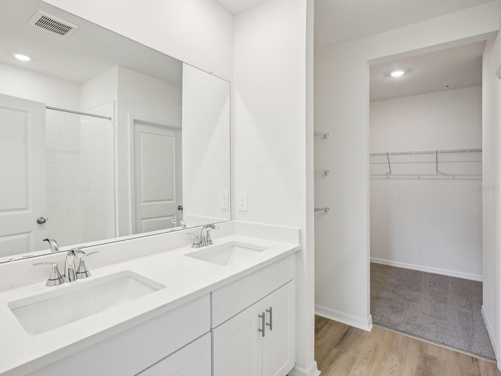 Photo is not of the actual home but of a builder home with same floorplan with similar interior finishes.