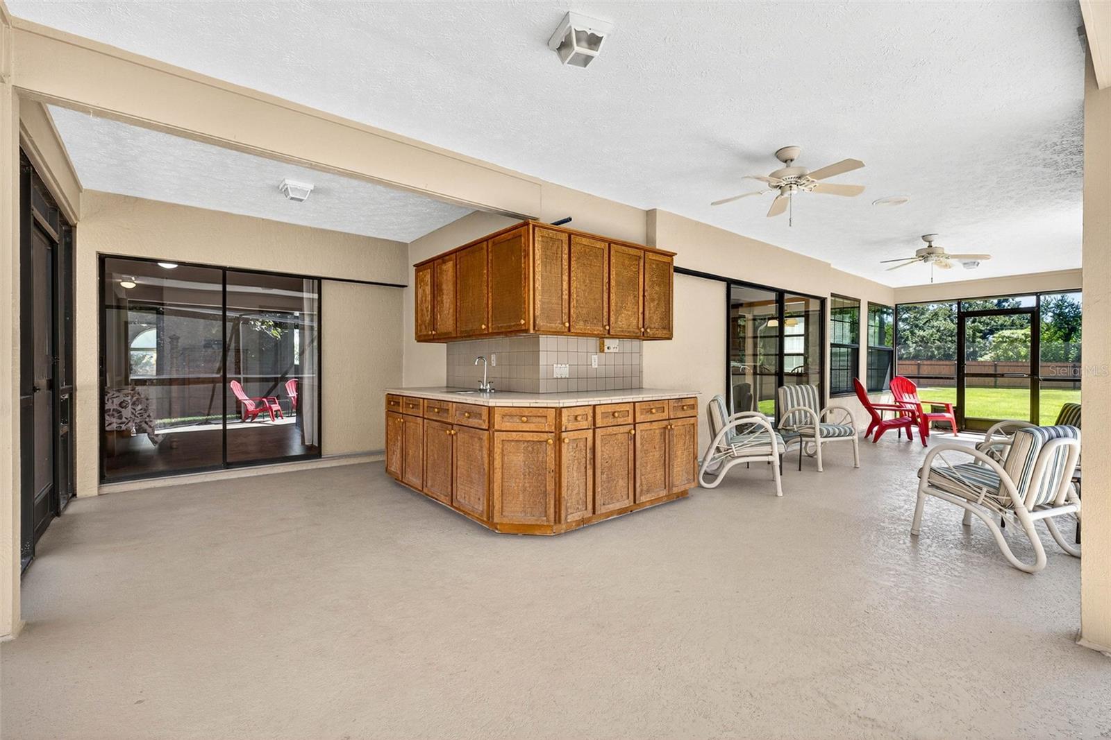 Screened lanai with storage and sink