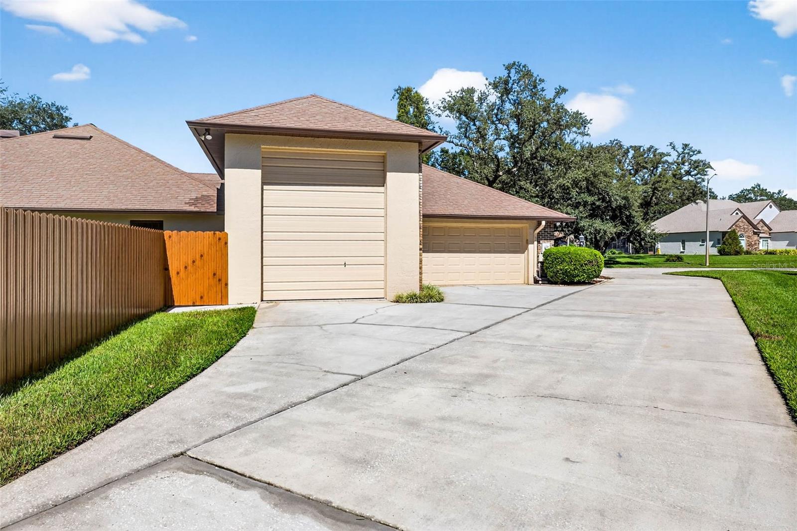 Oversized garage with room for a boat or RV and parking pad for maneuvering