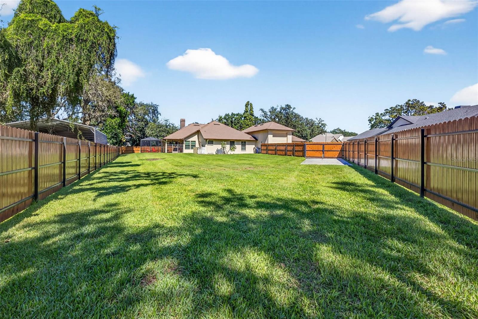HUGE backyard with room for a pool AND play space.  New $13K fence.