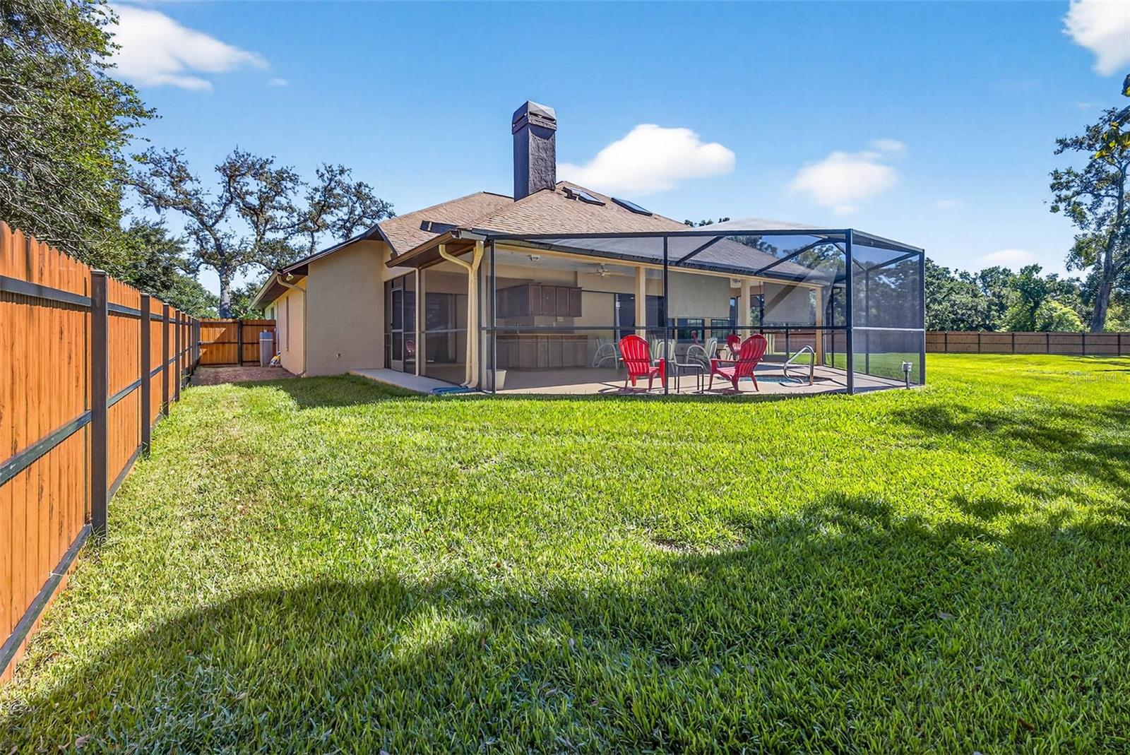 HUGE backyard with room for a pool AND play space.  New $13K fence.