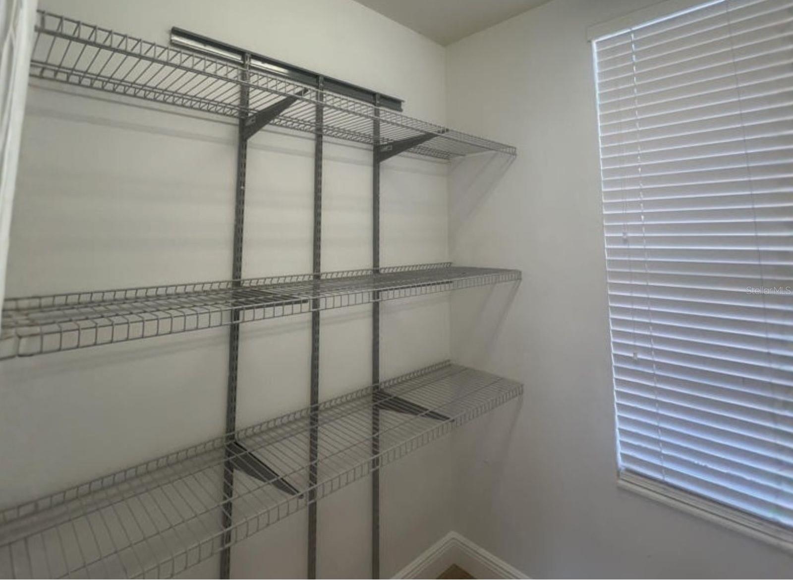 Laundry Room-With nice shelving for extra Storage