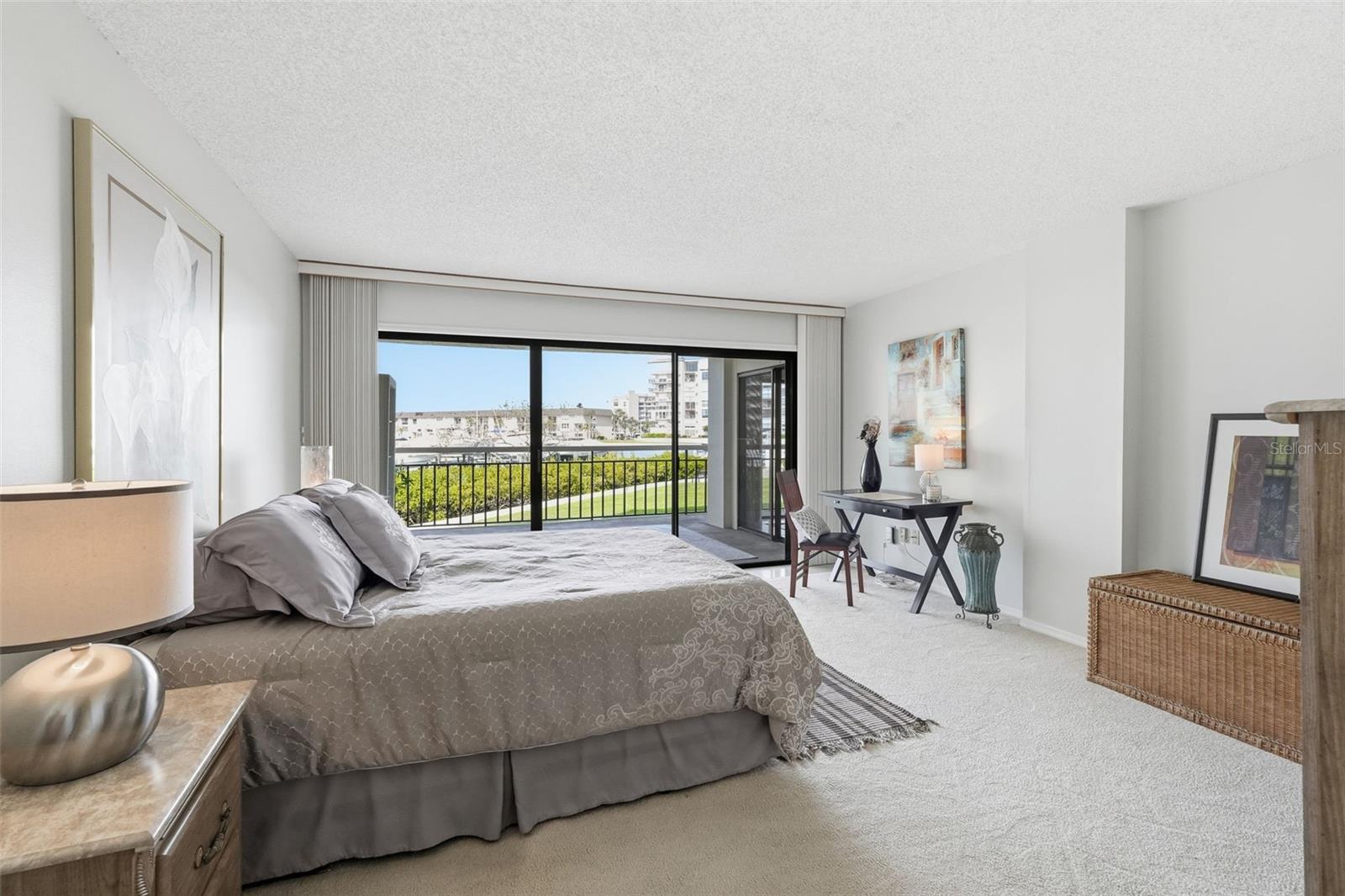 Bedroom with sliders to the patio.