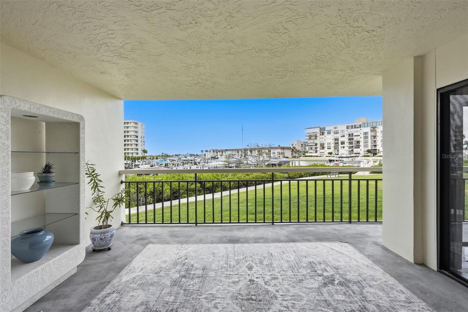 Open air patio can be enclosed with sliders