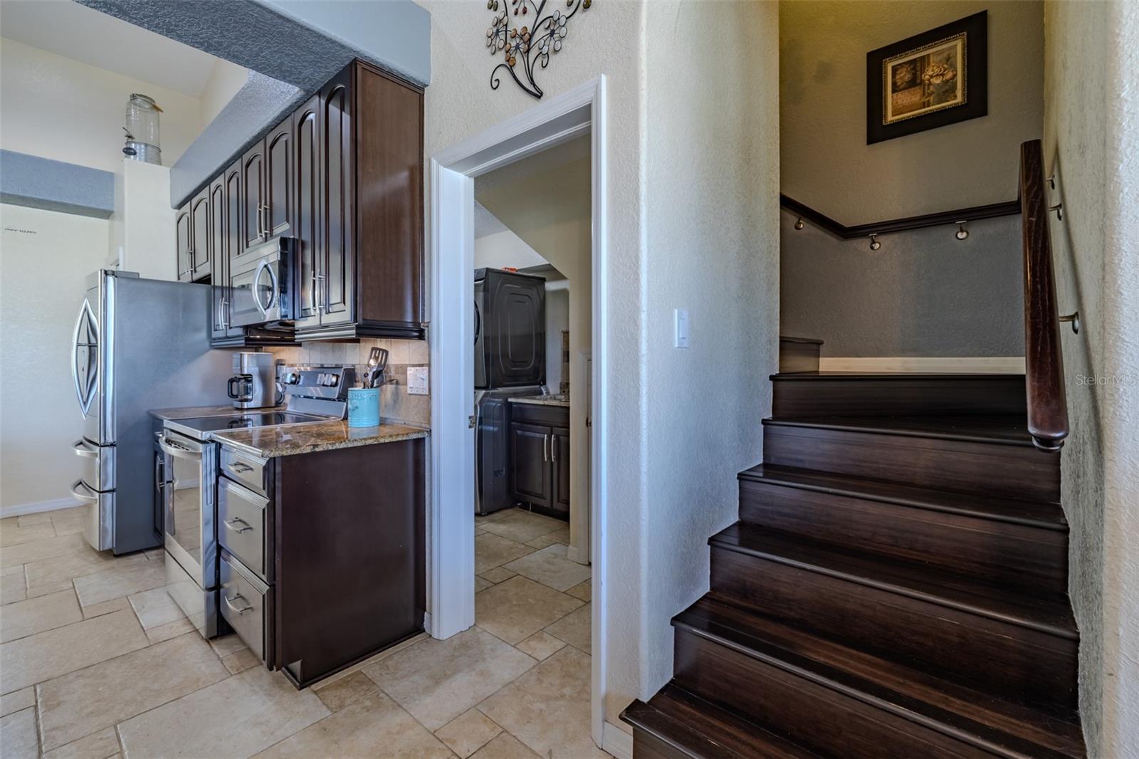 Kitchen/Laundry/ Stairs to 5th bedroom