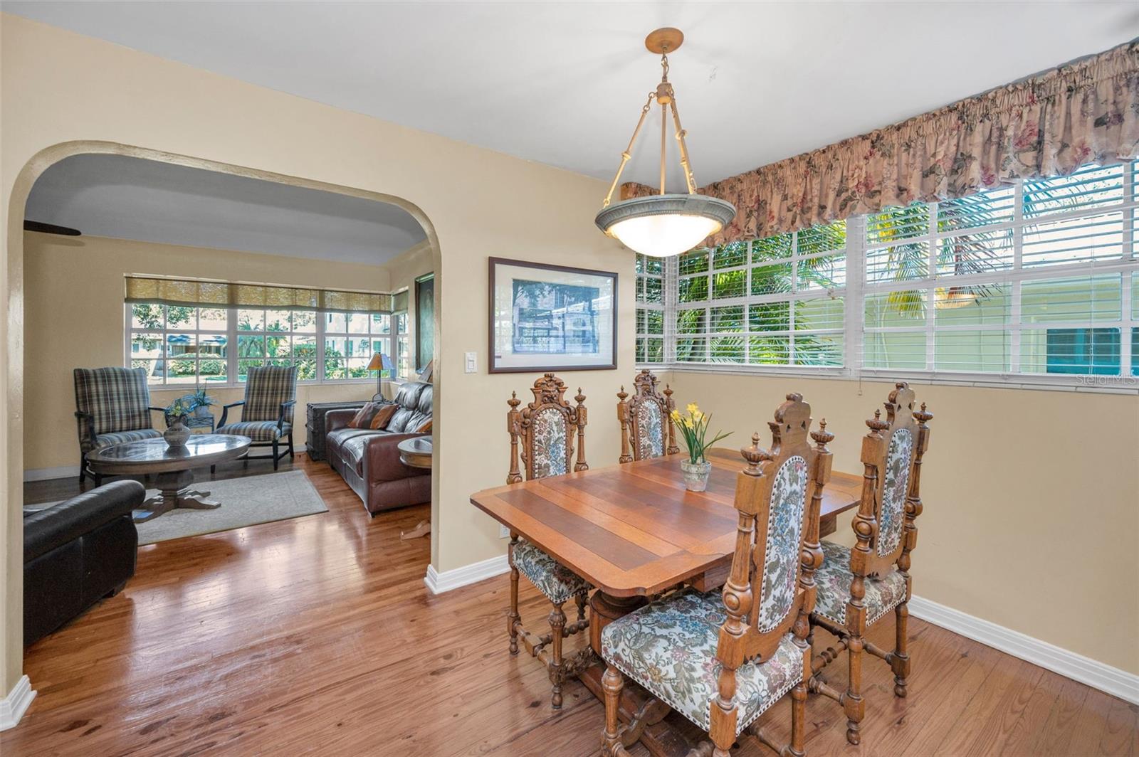 Natural light pours in through the many windows throughout.
