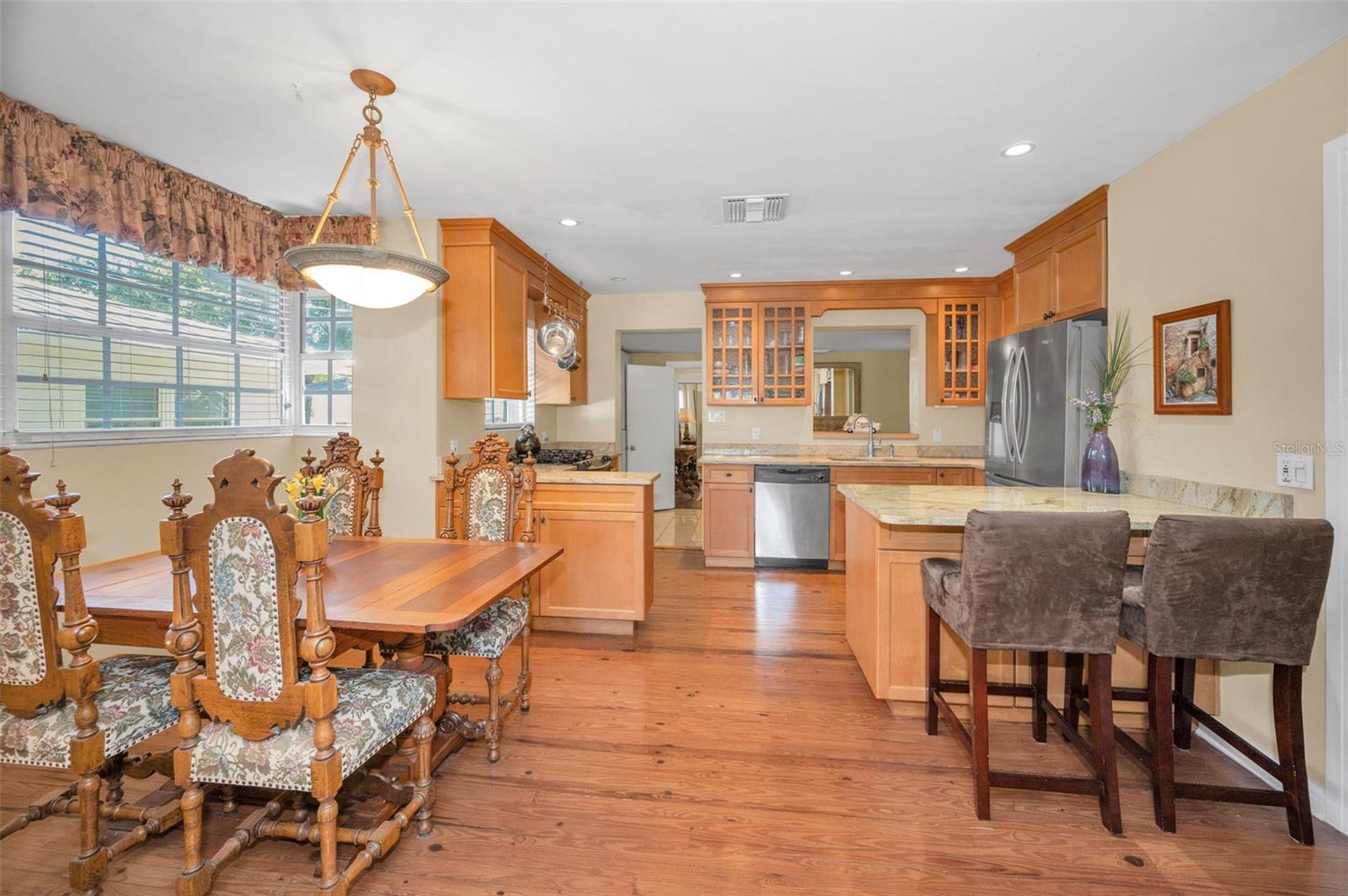 Updated Kitchen with gorgeous granite countertops and gas cooking.