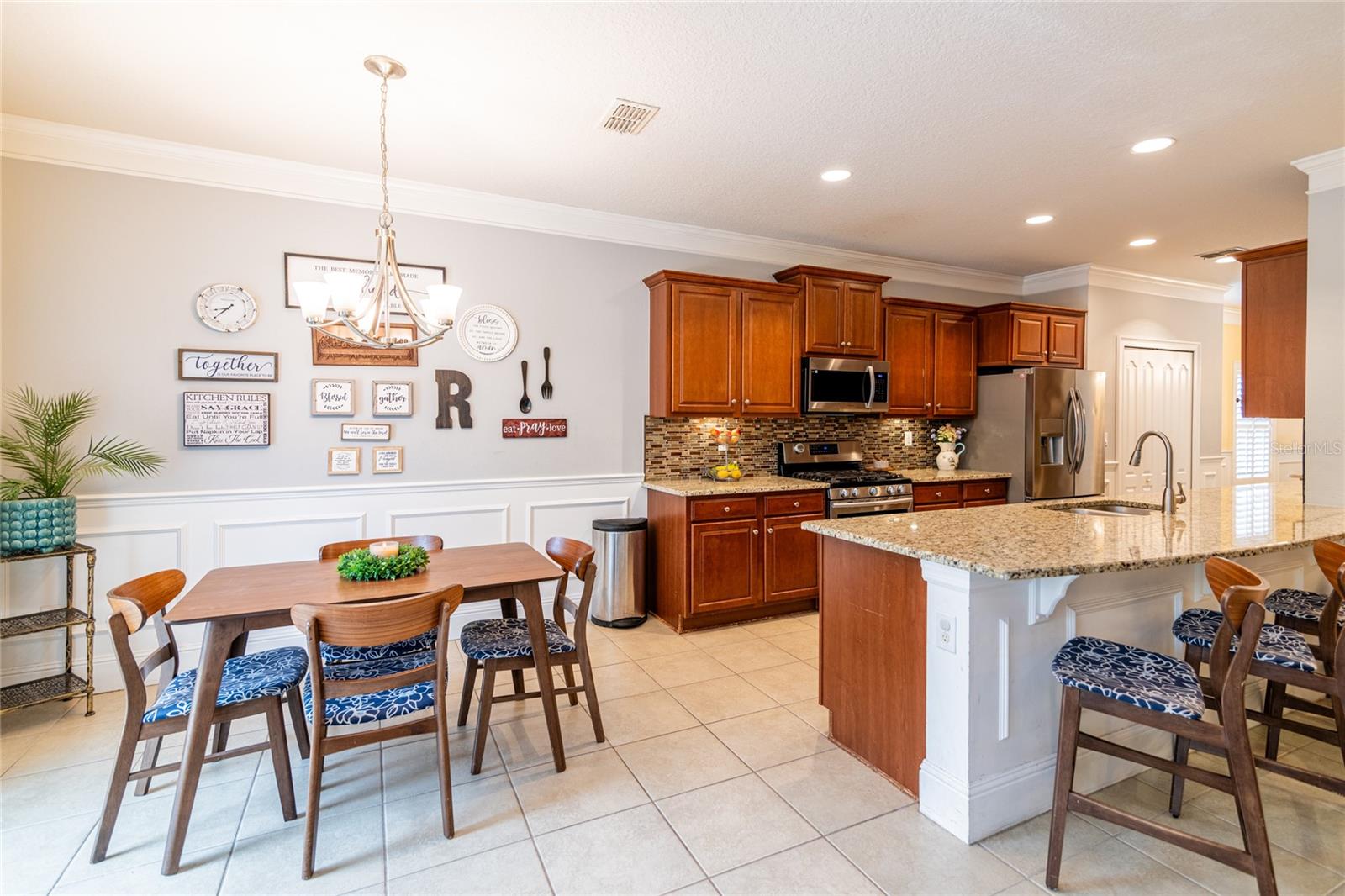Kitchen with large bar and dinette