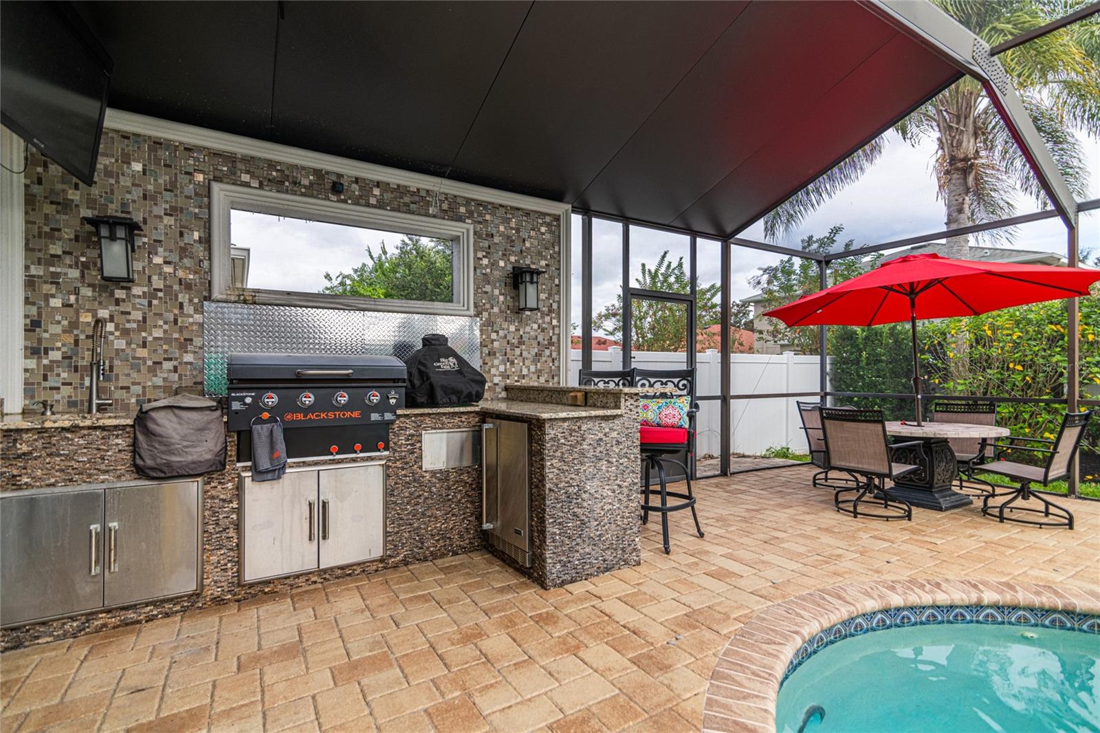 Blackstone Grill, Big Green Egg, Fridge, Sink and TV