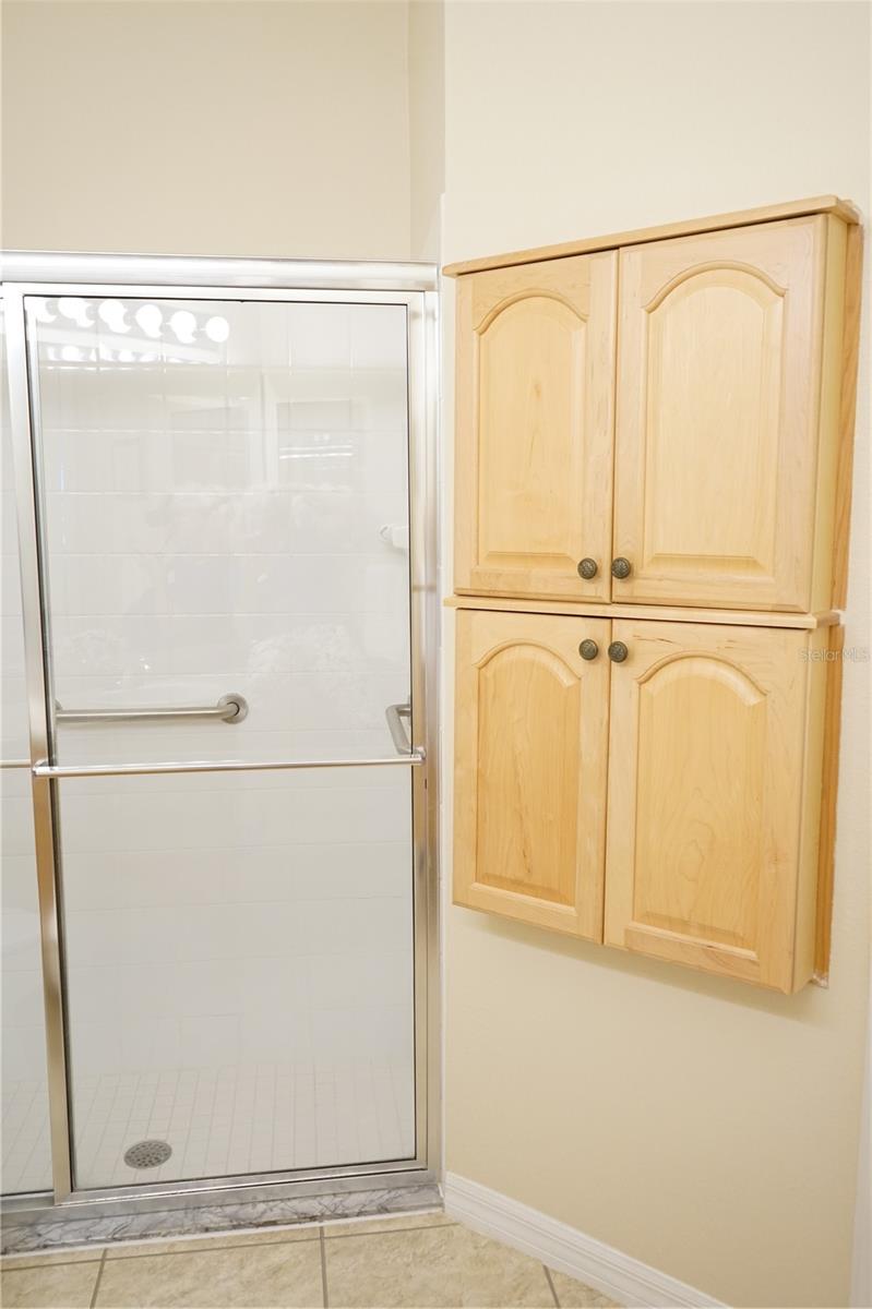 primary bath has extra cabinets