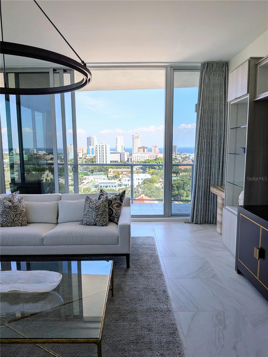 Custom Automated Drapes and California Closets Entertainment Center